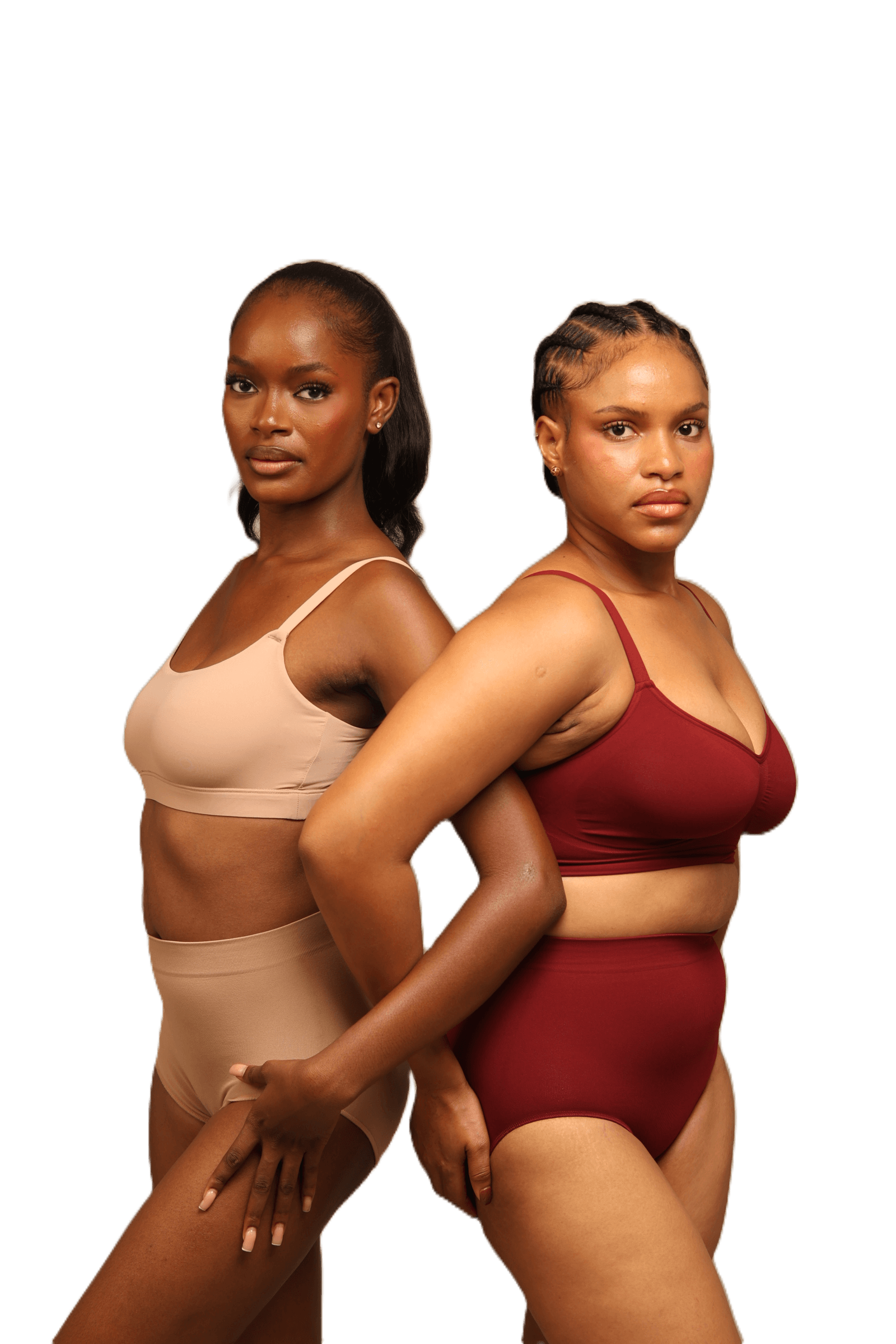 Two models wearing Augusta Newham bralettes and high waist briefs in nude and burgundy